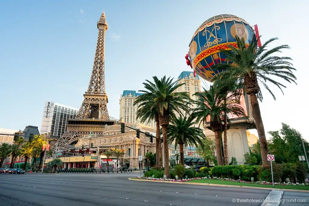 Cars And People By The Paris Hotel On The Famous Las Vegas Strip